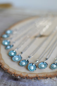Seashell jewelry freshwater pearl in the blue limpet shell