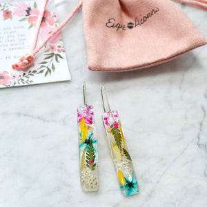 Unique earrings feature miniature bright flowers and leaves carefully arranged into a cheerful bouquet for pop of color. All flora is professionally preserved in high-quality jewelry grade Eco-resin and will last a lifetime for you to admire without loosing its original beauty.