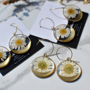'To be a daisy' brass daisy dangle earrings